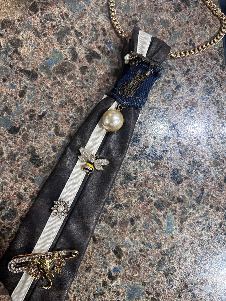 Brown faux leather tie with charms