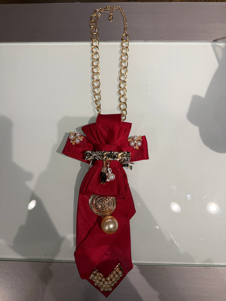 Hanging on The Red’s Necktie