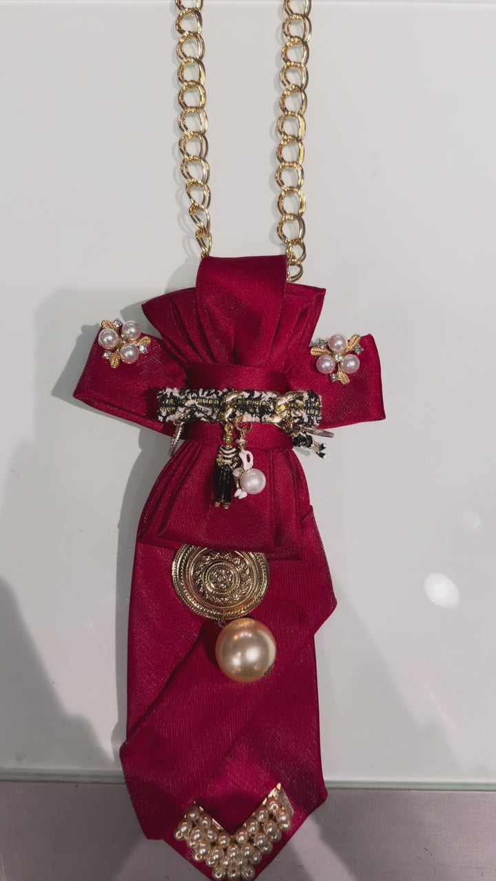 Hanging on The Red’s Necktie